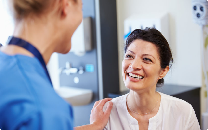 Woman smiling at her nurse